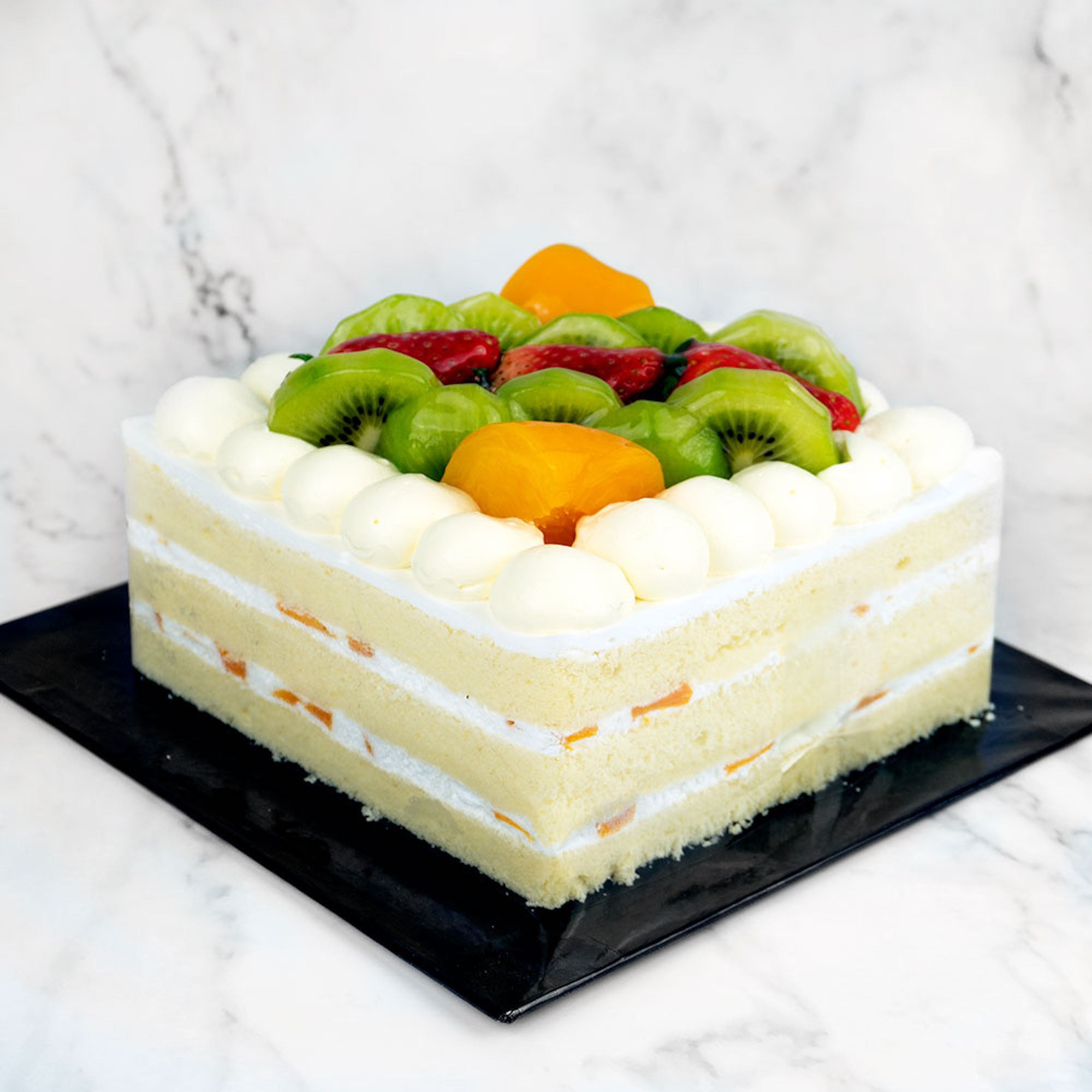 White Fruit Cake. a Large Double-decker Cake. a Birthday Cake Covered with  Cream and Fruit Stock Image - Image of doubledecker, whipped: 176790013